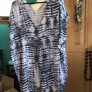 Black and white sleeveless blouse